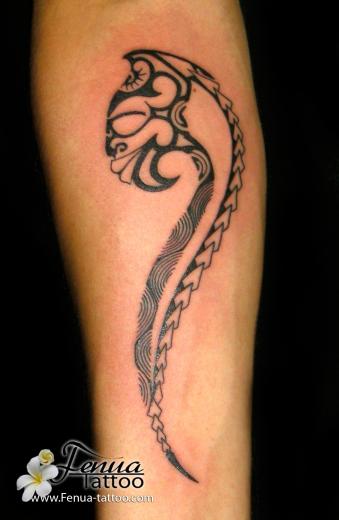 12b°) tattoo de tikki polynesien sur avant bras